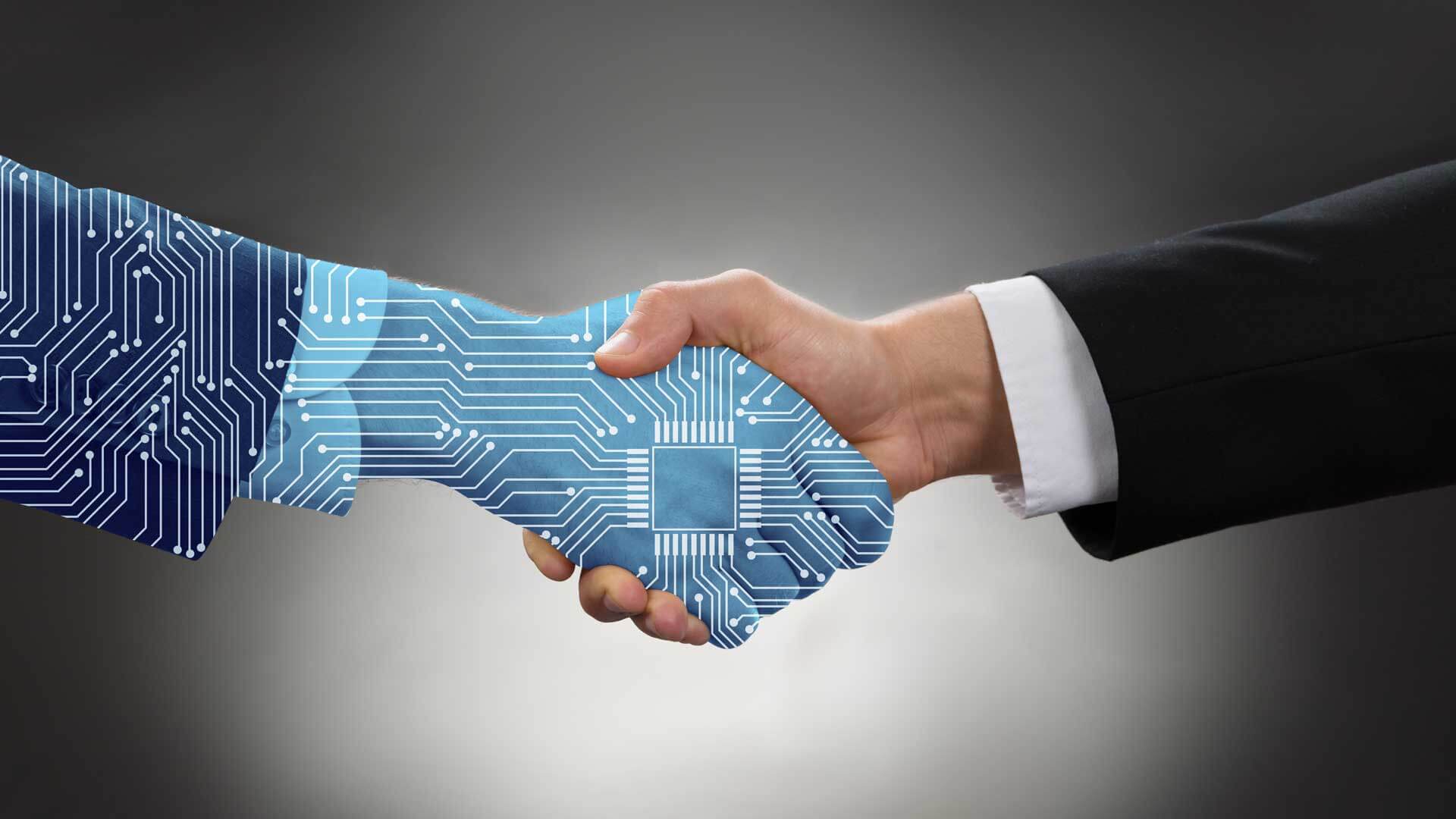 A man and a technology shaking hands